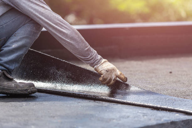 Professional Basement Waterproofing technician working in Lawrenceville, GA